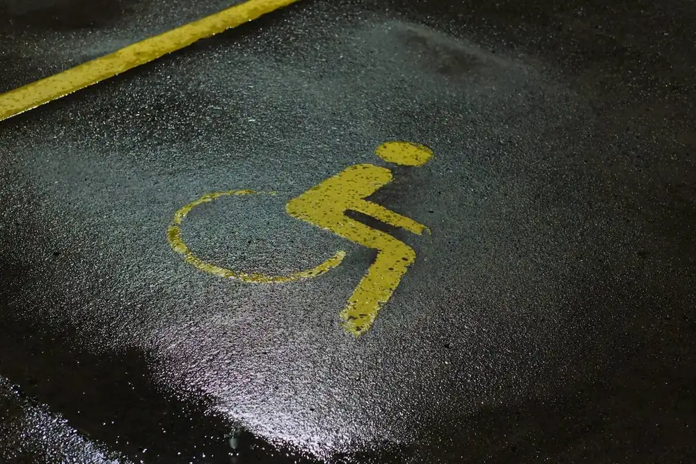 Sealcoated surface with ADA symbol